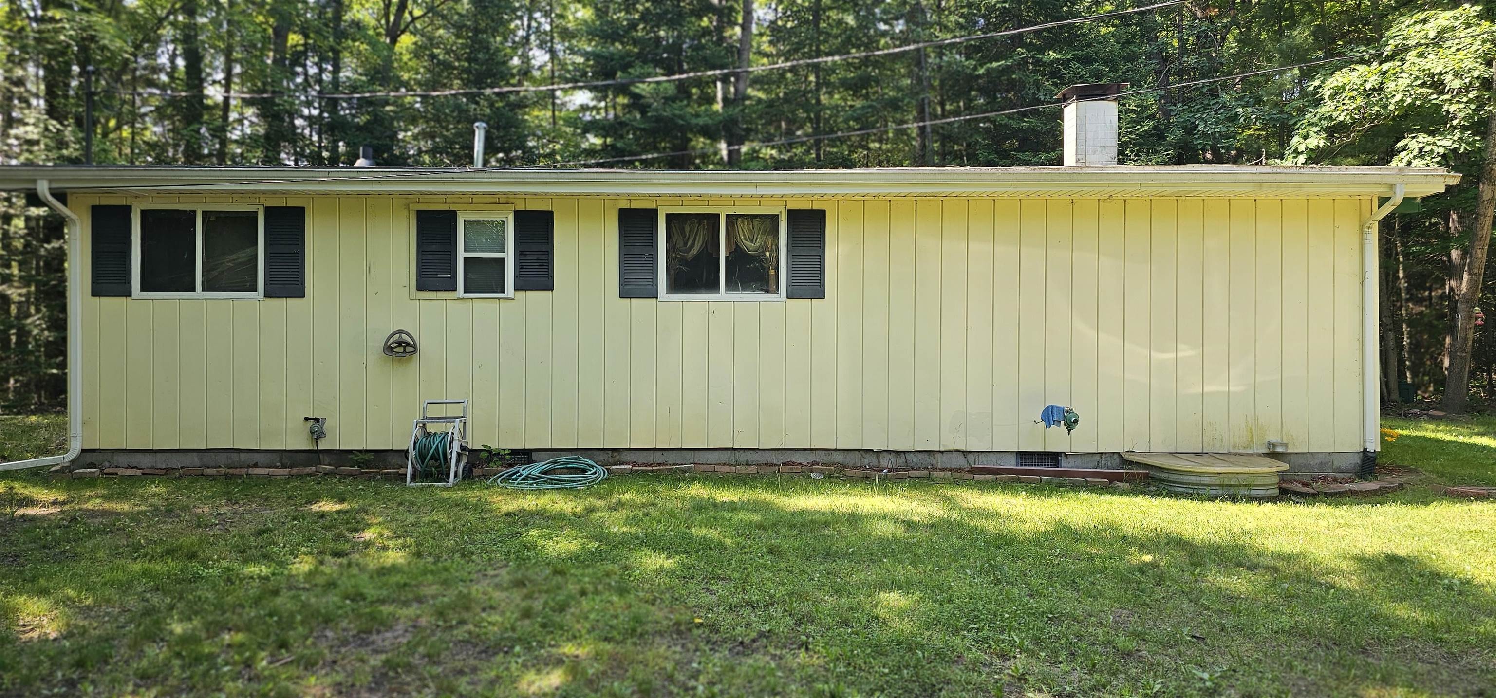 Property Photo:  4740 Wildwood Rd Corner  MI 48610 