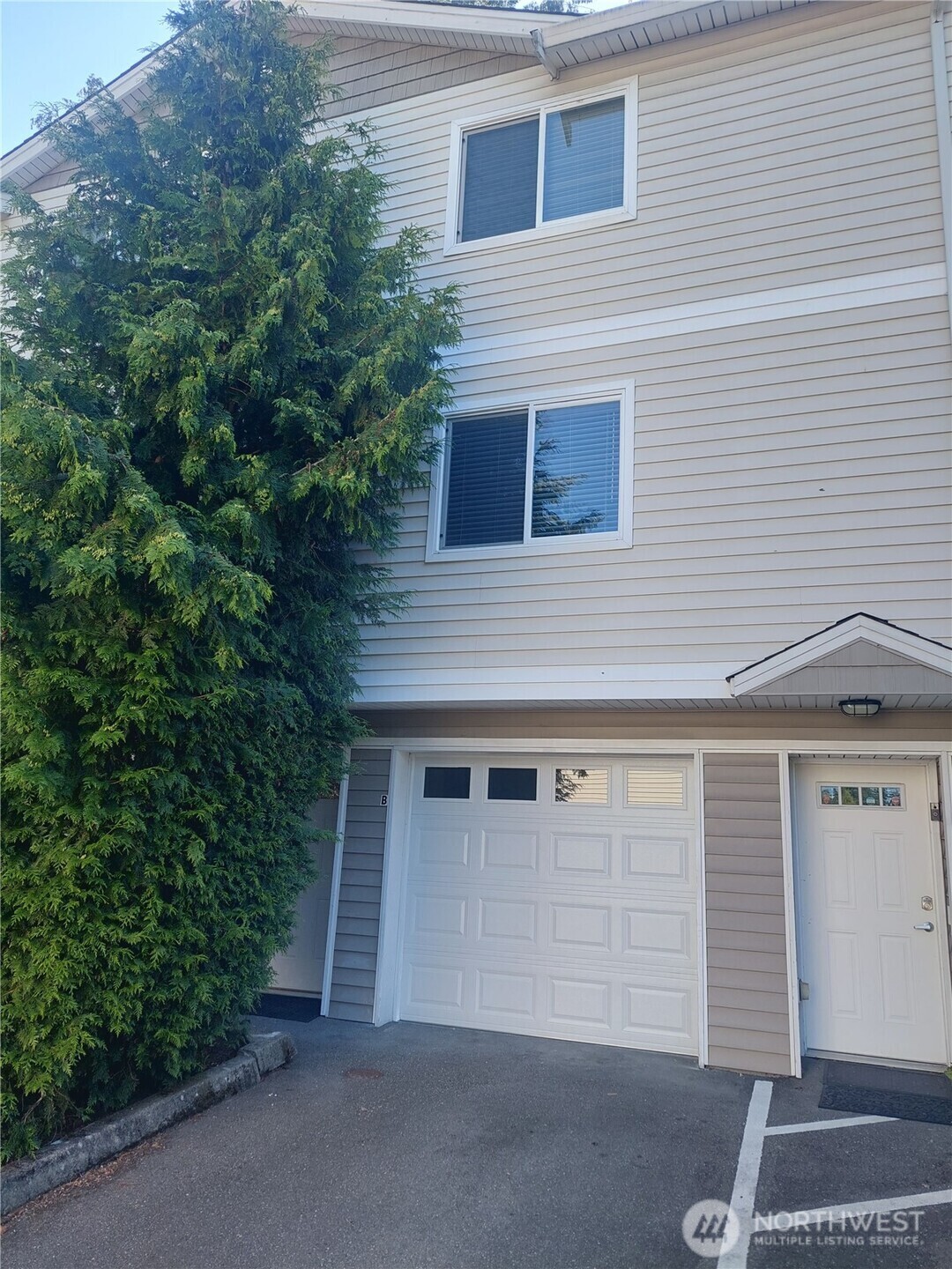 Property Photo:  6907  Rainier Drive E 1B  WA 98203 