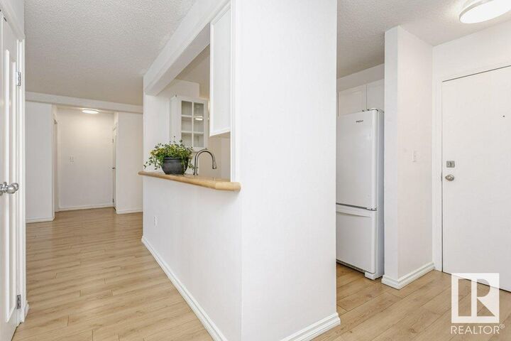Property Photo:  10636 120 Street NW 140  AB T5H 4L5 
