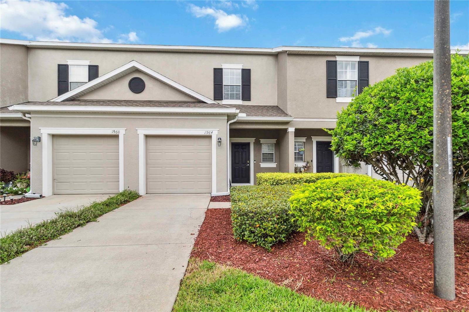 Property Photo: 1964 Compass Flower Way FL 34761