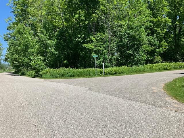 Property Photo:  Tbd Maple Isle Court Unit 32  MI 49706 