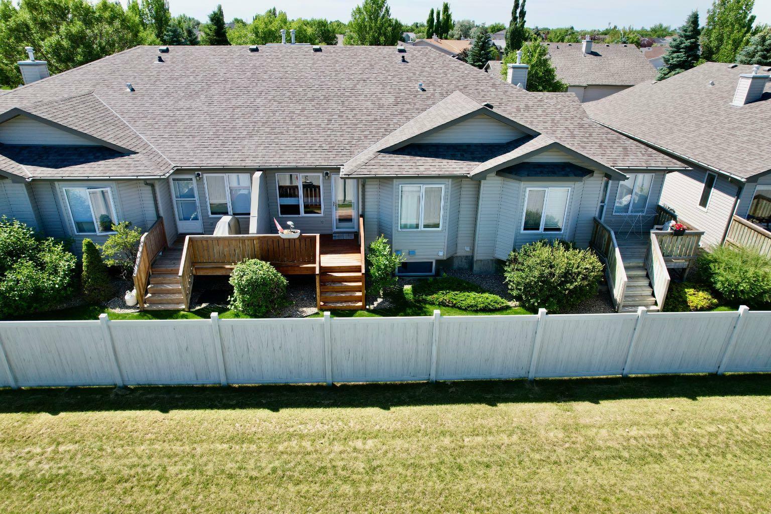 Property Photo: 284 Cougar Way N 6 AB T1H 6T9