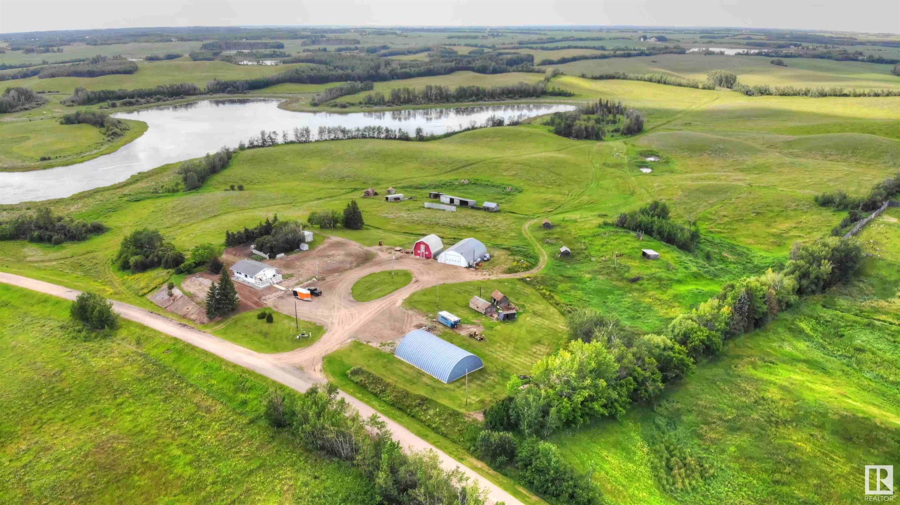 Property Photo: 8318 Twp Rd 572 AB T0A 3A0