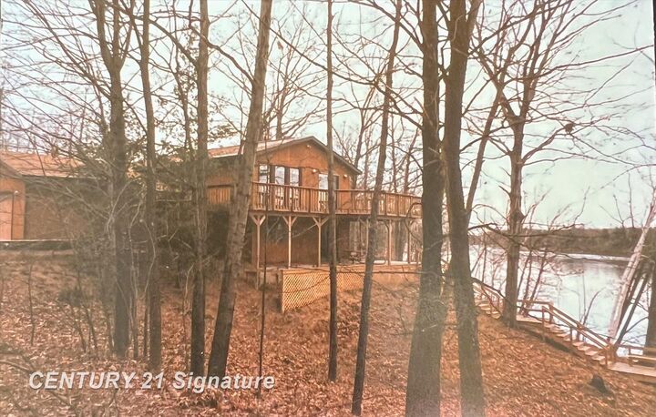 Property Photo:  5092 N Lake Sanford Road  MI 48657 
