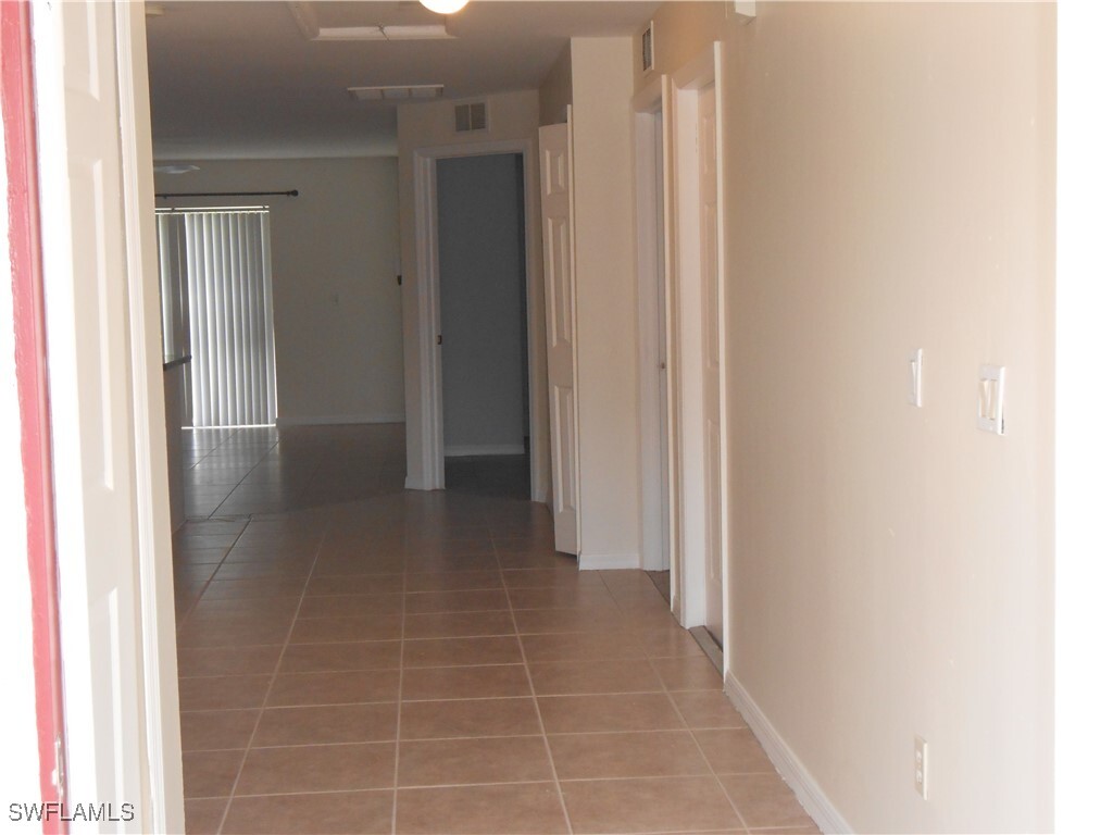 Property Photo: 4428 28th Street SW FL 33973