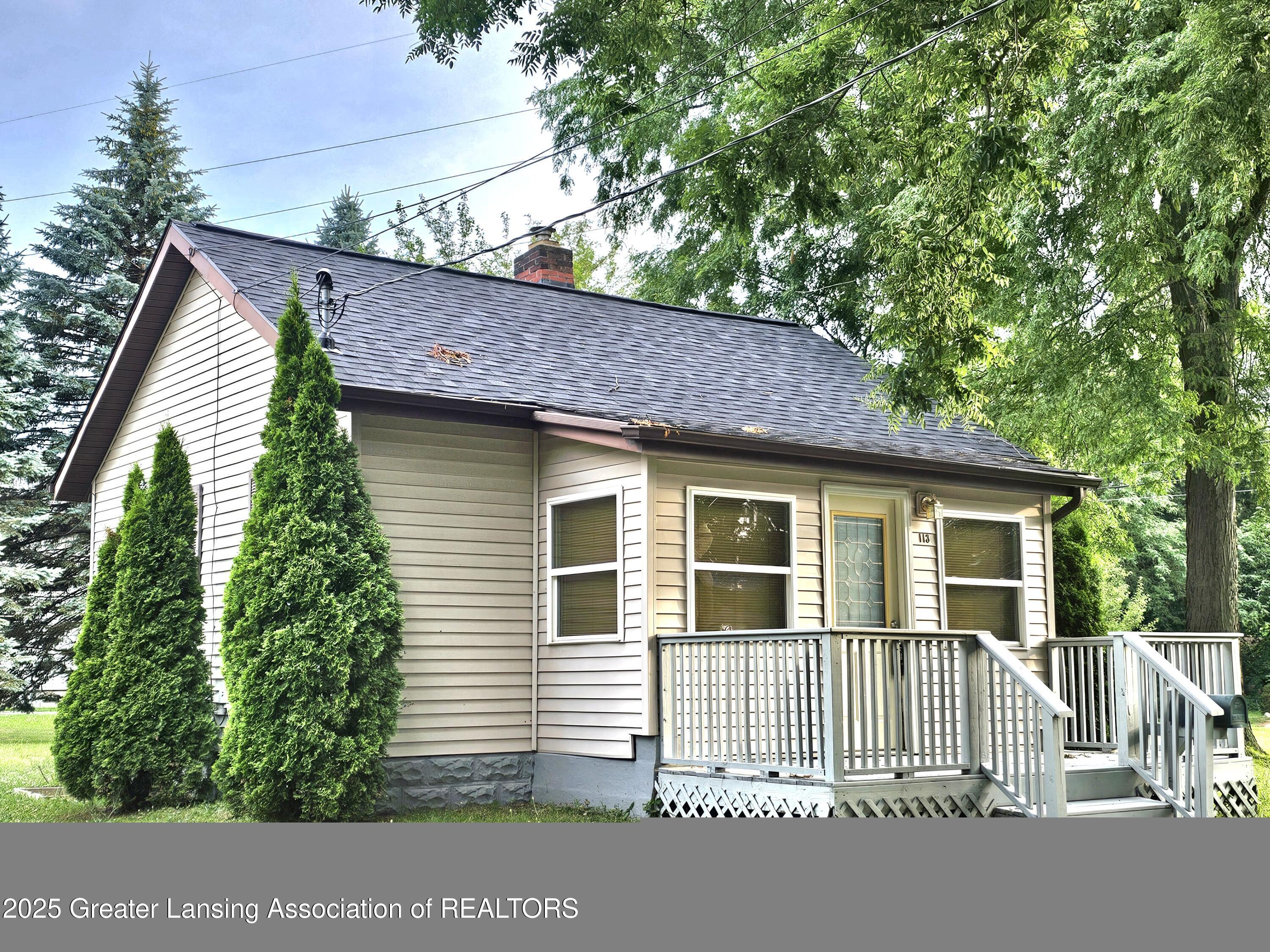 Property Photo:  113 W Gier Street  MI 48906 