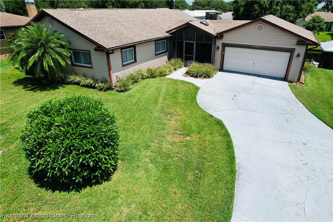 Property Photo:  112 Loquat Road NE  FL 33852 