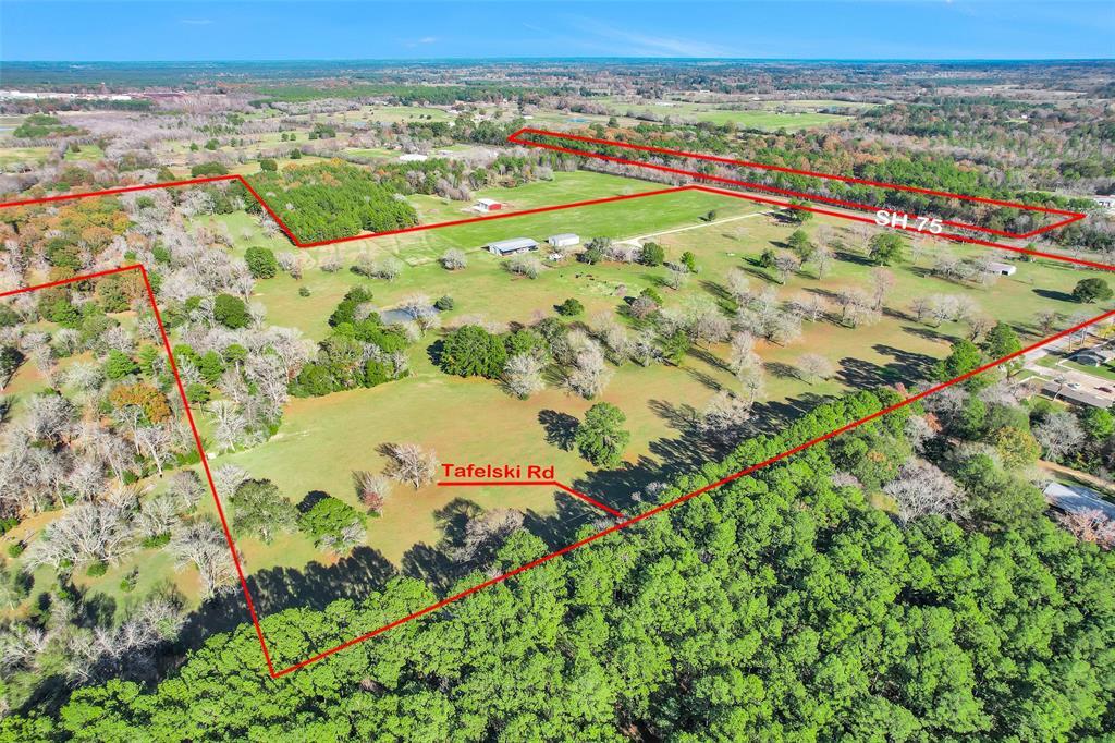 Property Photo: 9192 Sh 75 S Highway S TX 77358