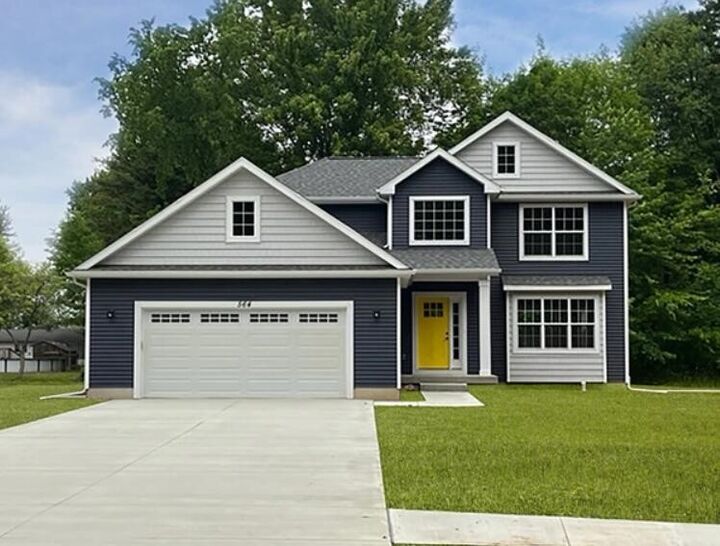 Property Photo: 563 W Wildwood Drive MI 48867-9119