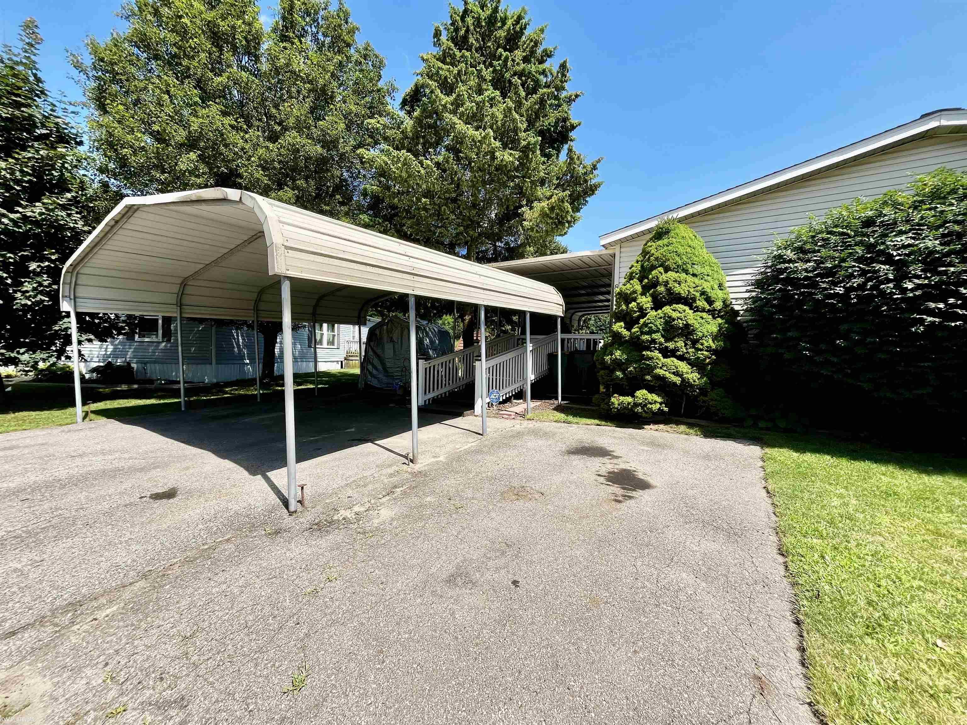 Property Photo: 2500 Mann Road, Lot 83 MI 48346