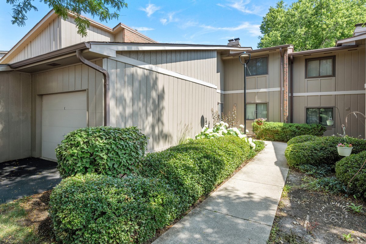 Property Photo: 29W440 Emerald Green Drive 25-F IL 60555