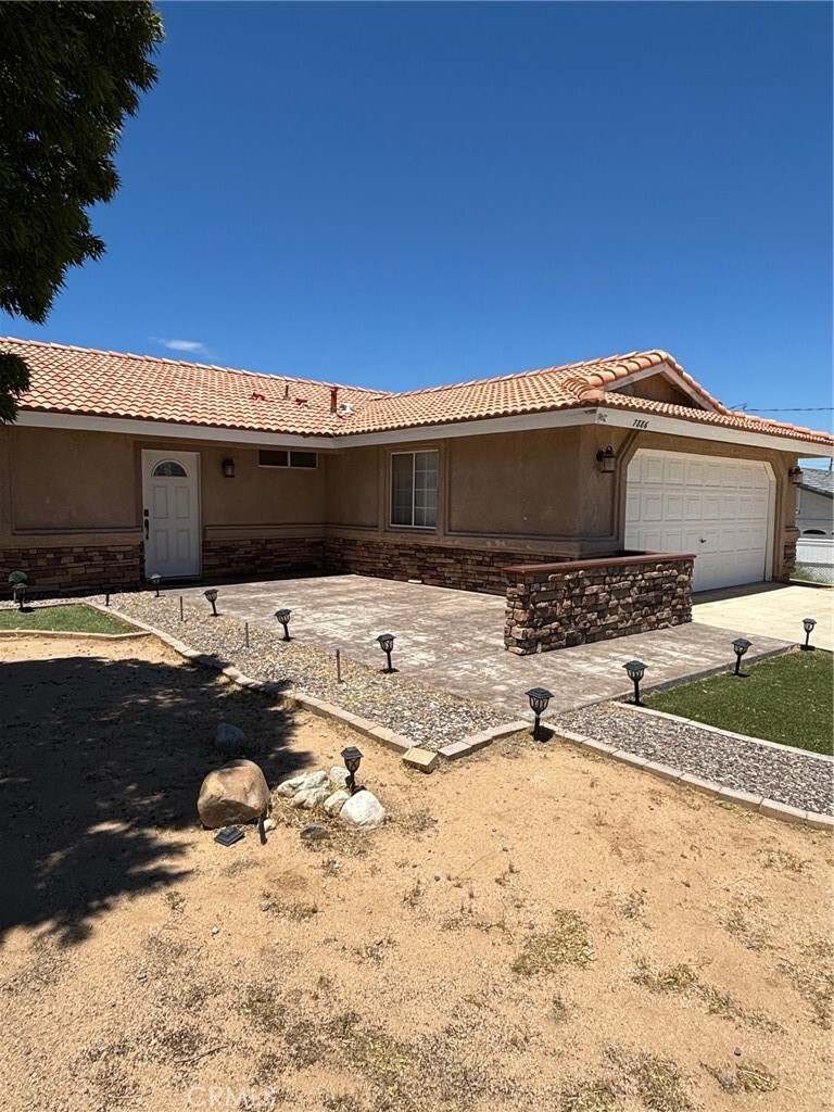 Property Photo:  7886 Pismo Avenue  CA 92345 