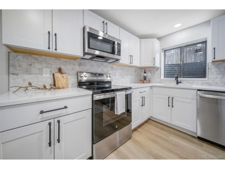 Property Photo: 8367 S Reed St A2 CO 80128