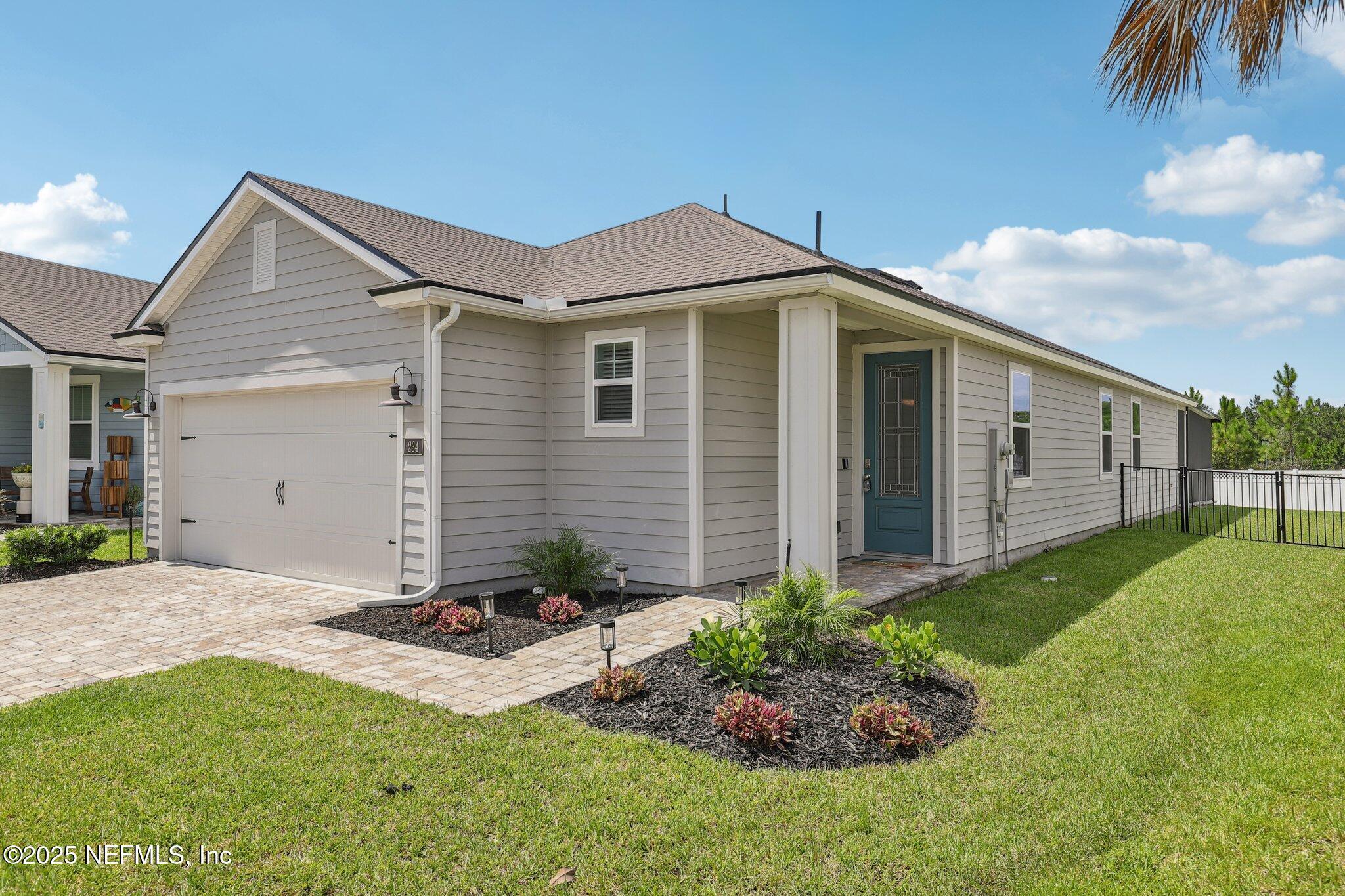 Property Photo: 234 Thistleton Way FL 32092