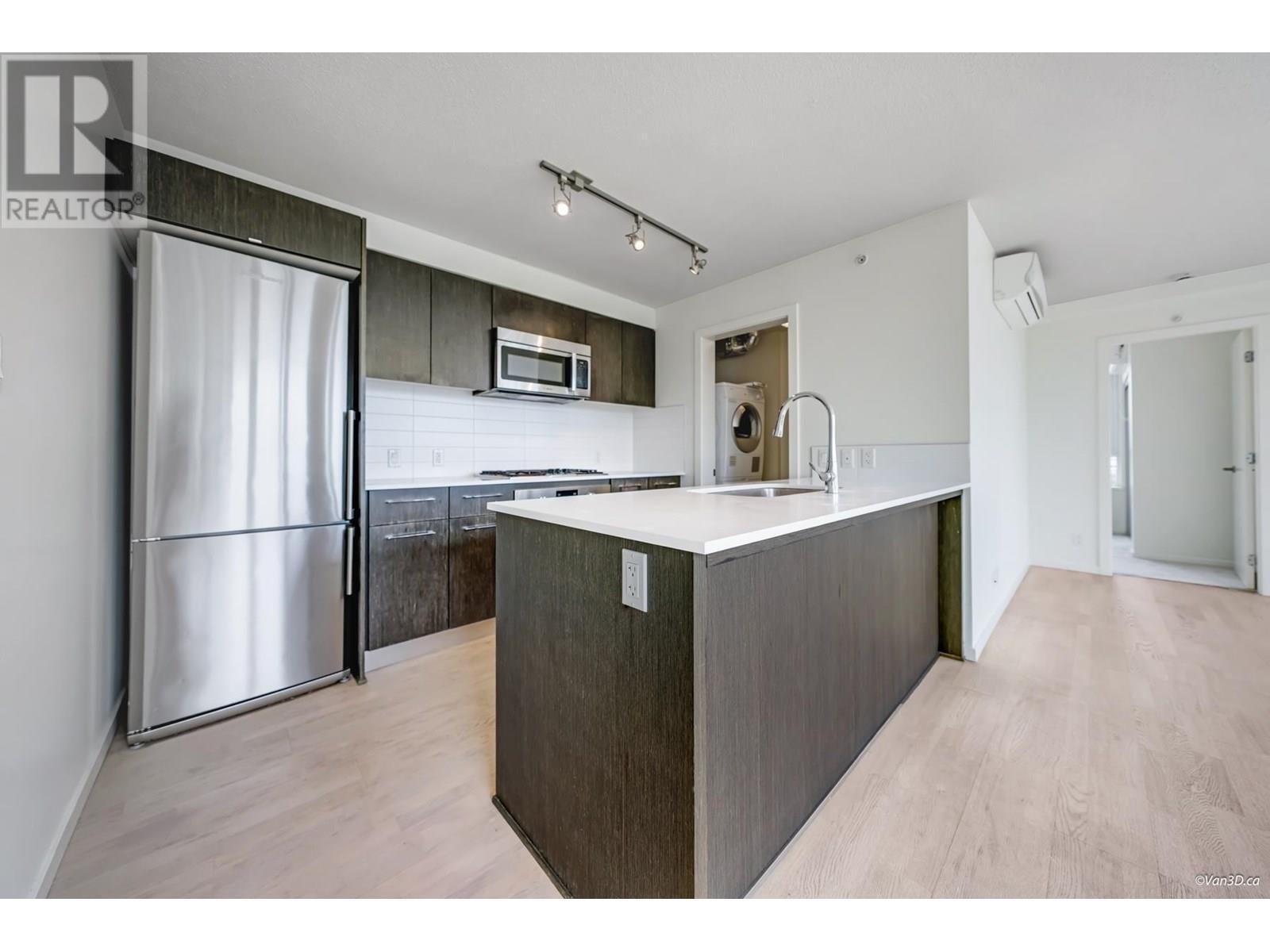 Property Photo: 7888 Ackroyd Road 1110 BC V6X 0M9