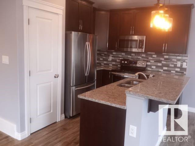 Property Photo: 15144 14 Street NW AB T5Y 0Y7