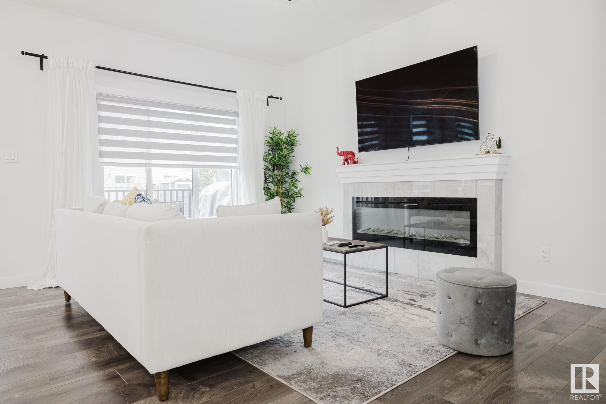 Property Photo: 7209 Chivers Place SW AB T6W 4L4