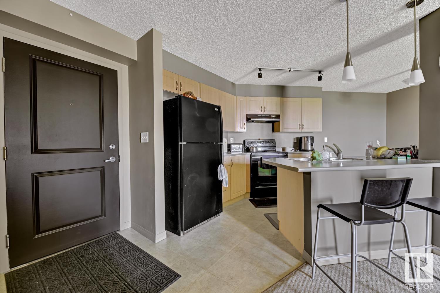 Property Photo:  11441 Ellerslie Road SW 308  AB T6W 1S9 