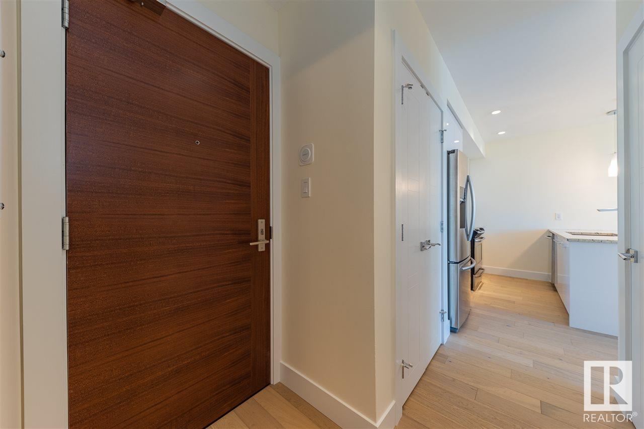 Property Photo: 11969 Jasper Avenue NW 401 AB T5K 0P1