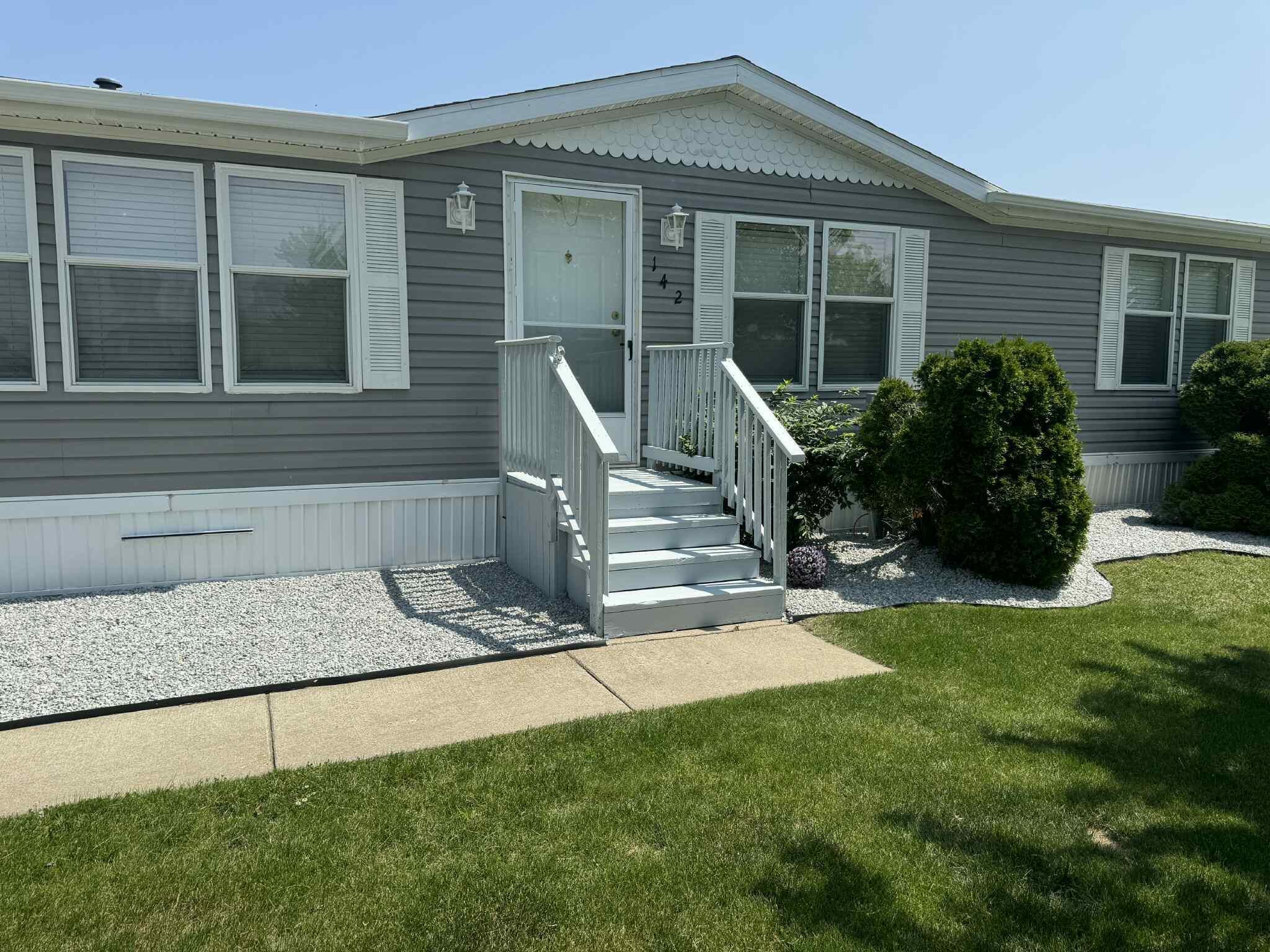 Property Photo: 7204 E Grand River Ave MI 48875