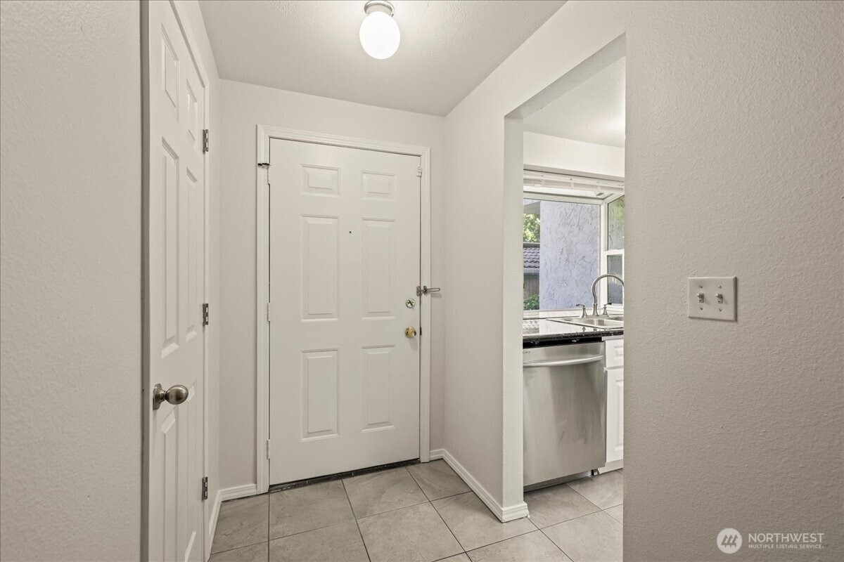 Property Photo:  12828 SE 41st Lane C-103  WA 98006 