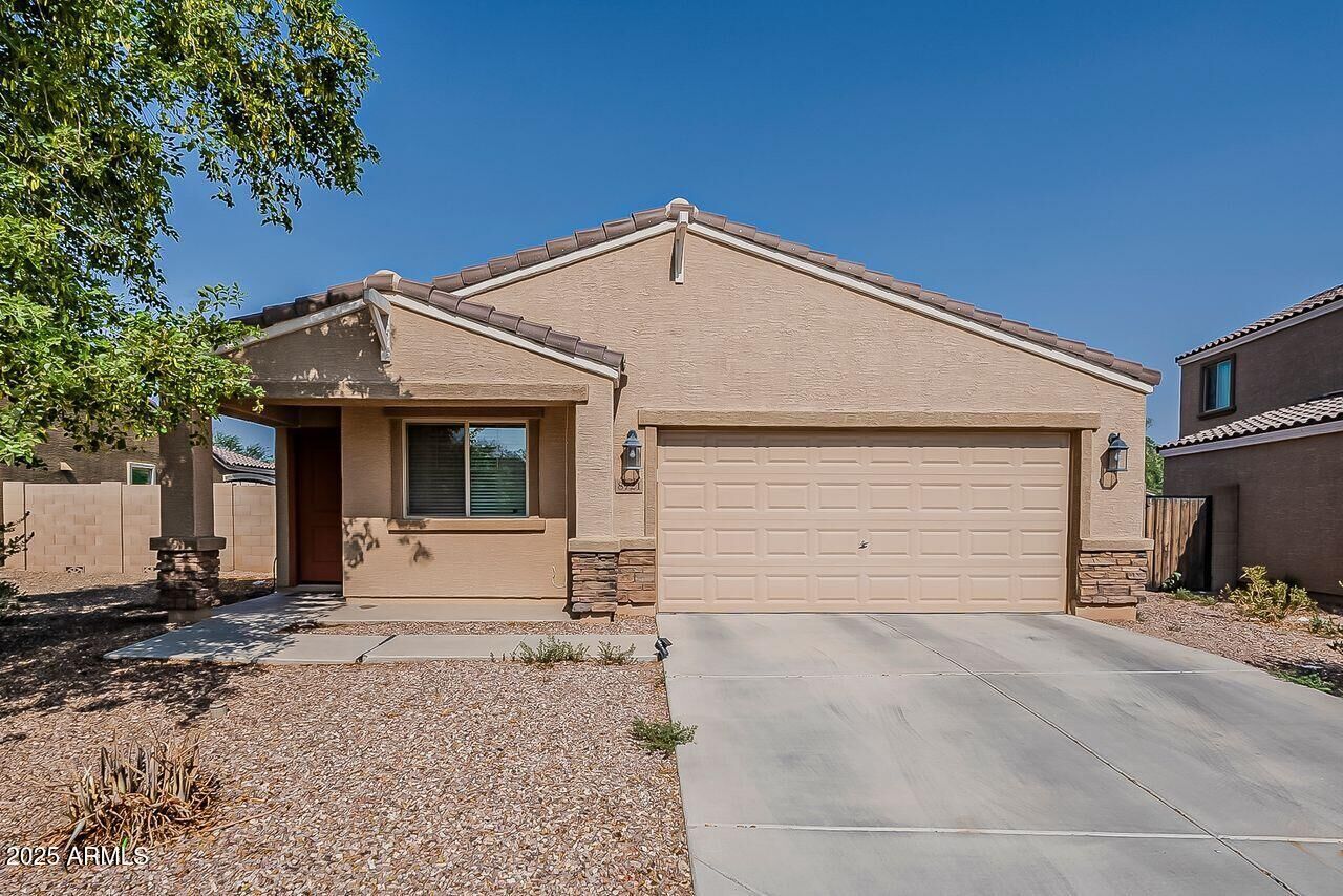 Property Photo:  8721 S 253rd Drive  AZ 85326 