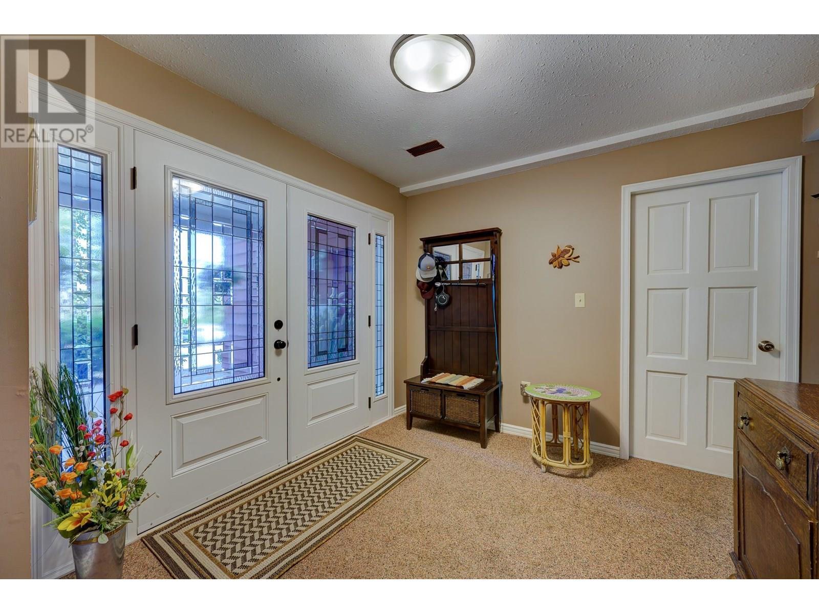 Property Photo: 2073 Holyrood Place BC V1S 1E7
