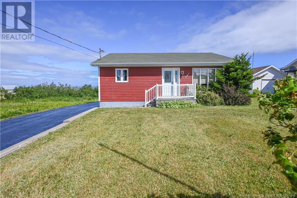 Property Photo: 301 Rue De L'Ile Street NB E1W 1B5