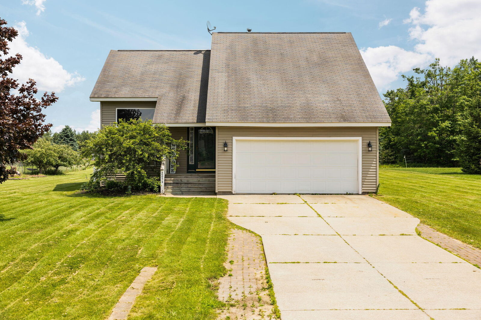 Property Photo:  2654 Hickorywood Drive  MI 49735 