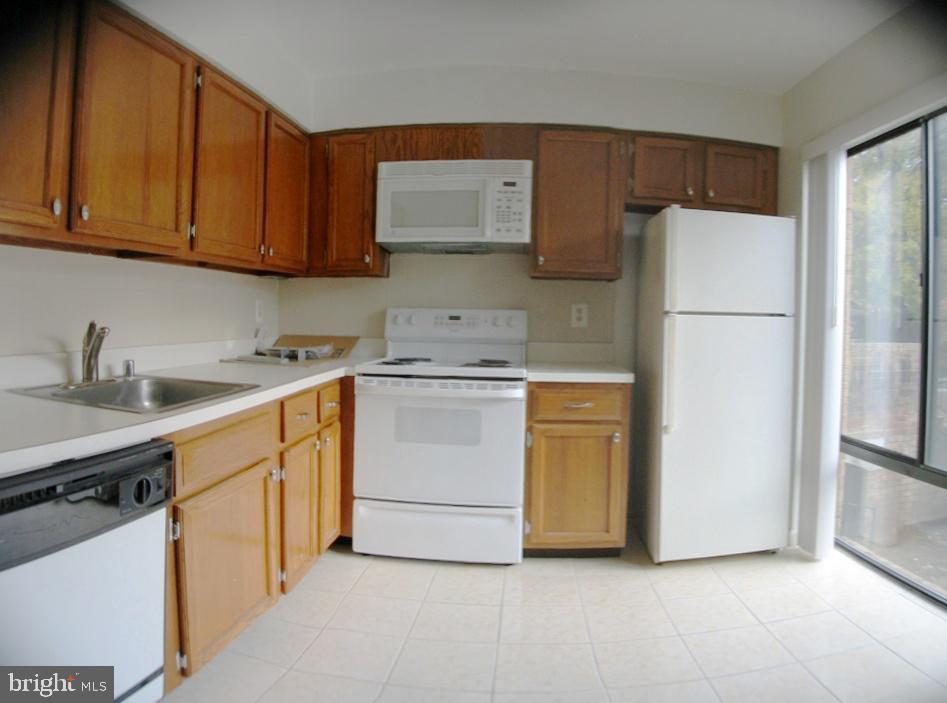 Property Photo:  3024 Gentain Court NE 3024  DC 20017 