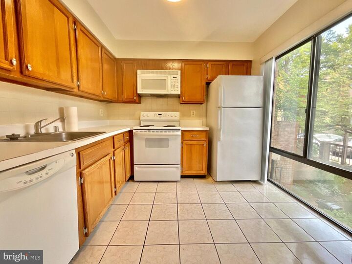 Property Photo:  3024 Gentain Court NE 3024  DC 20017 