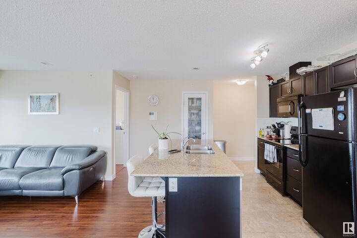 Property Photo: 12650 142 Avenue NW 415 AB T5X 0J4