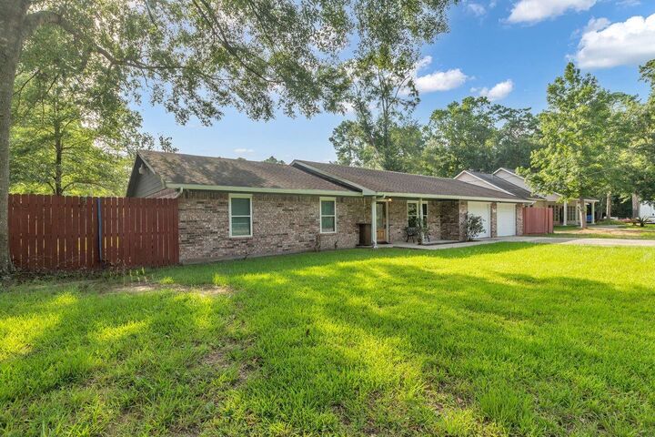 Property Photo: 22106 Sandalwood Street TX 77365