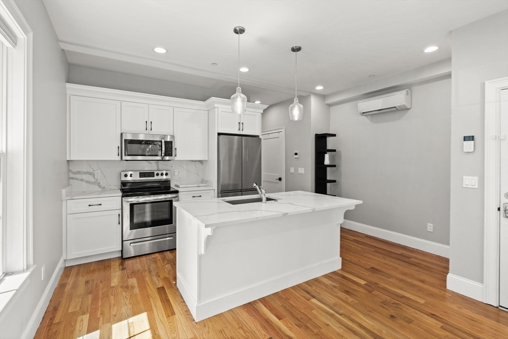 Property Photo: 3305-3309 Washington St 102 MA 02130