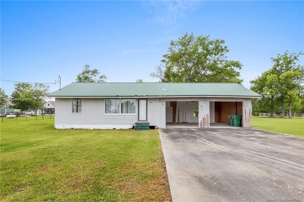 Property Photo:  7681 Acadian Lane  LA 70607