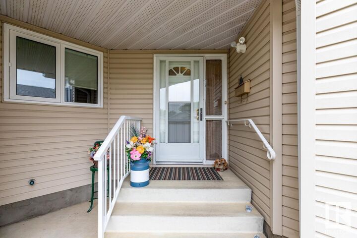 Property Photo:  10860 25 Avenue NW  AB T6J 6N5 