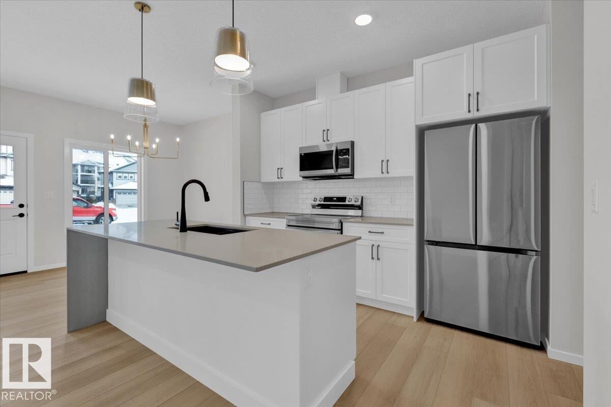 Property Photo:  133 Hilton Cove  AB T7X 1Y4 