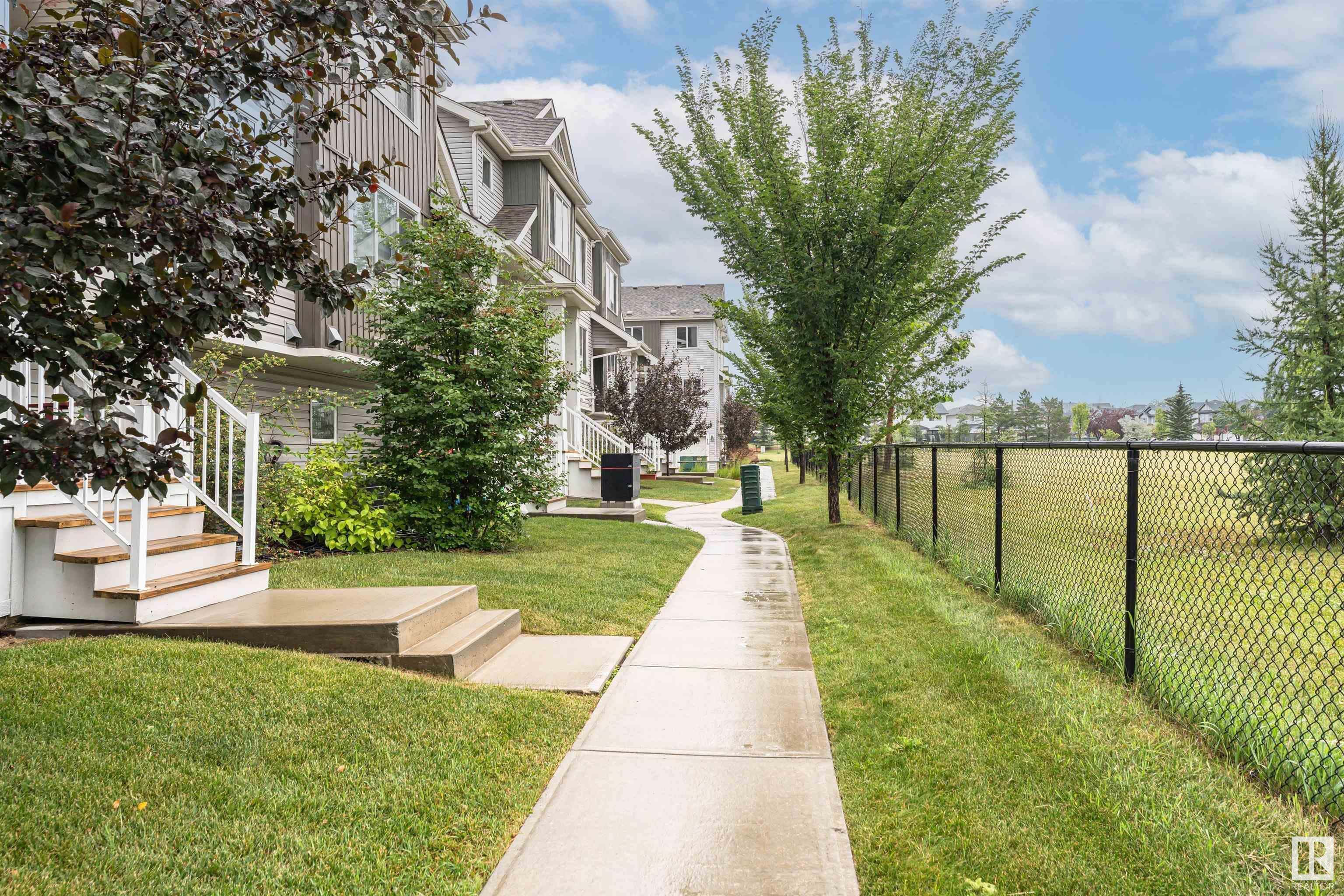 Property Photo: 2121 Haddow Drive NW 13 AB T6R 0W6