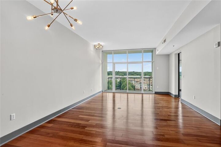 Property Photo:  4561 Olde Perimeter Way 1207  GA 30346 