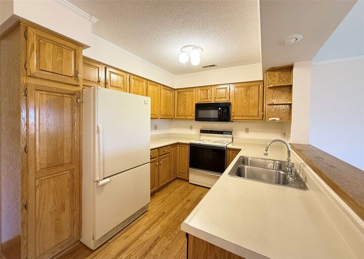 Property Photo:  405 SE Delaware Avenue 207  IA 50021 