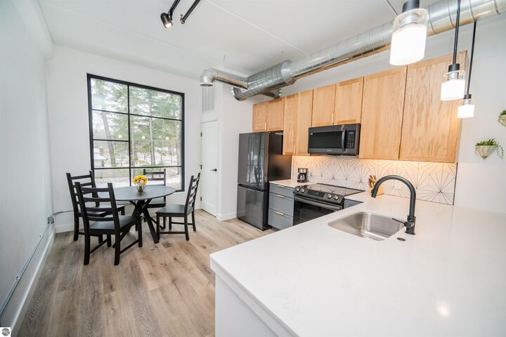 Property Photo: 1825 E Eighth Street Unit 219 MI 49686
