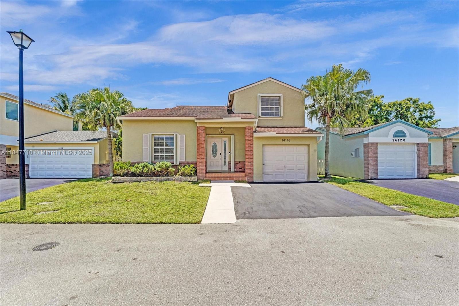 Property Photo: 14116 Langley Pl FL 33325
