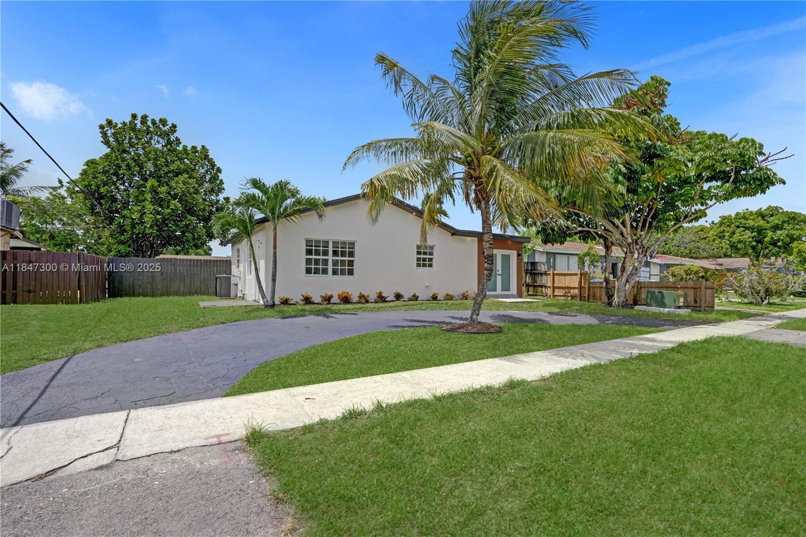 Property Photo: 6220 NW 12th Ct FL 33313