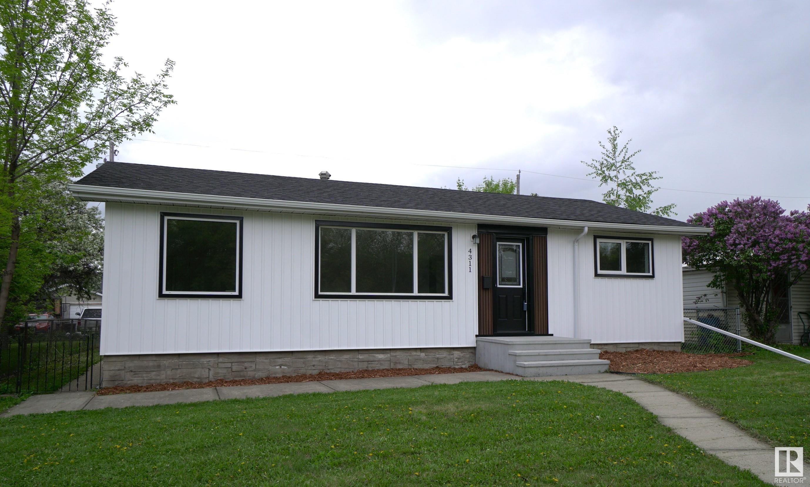 Property Photo: 4311 106 Avenue NW AB T6A 1E1