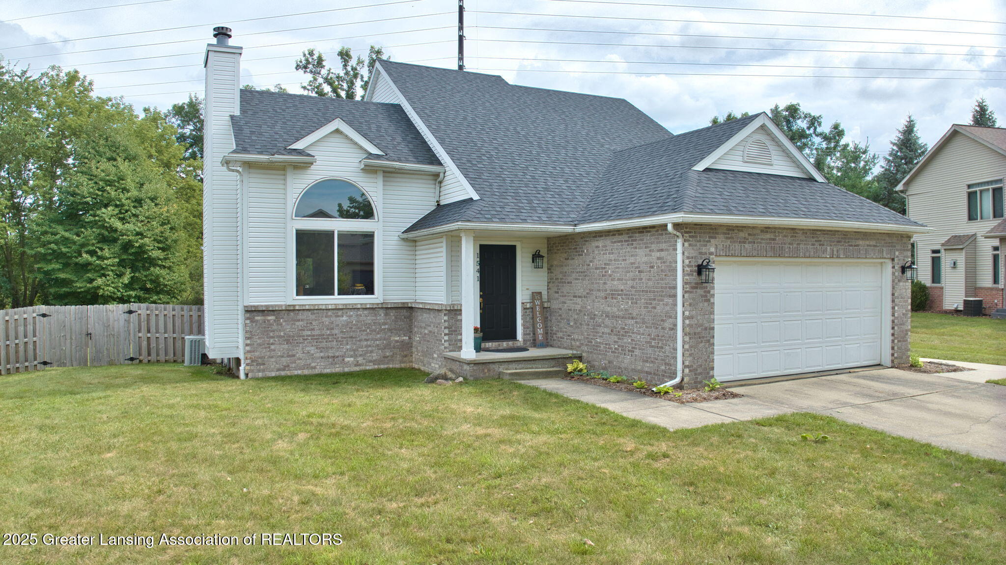 Property Photo: 1541 Downing Street MI 48840