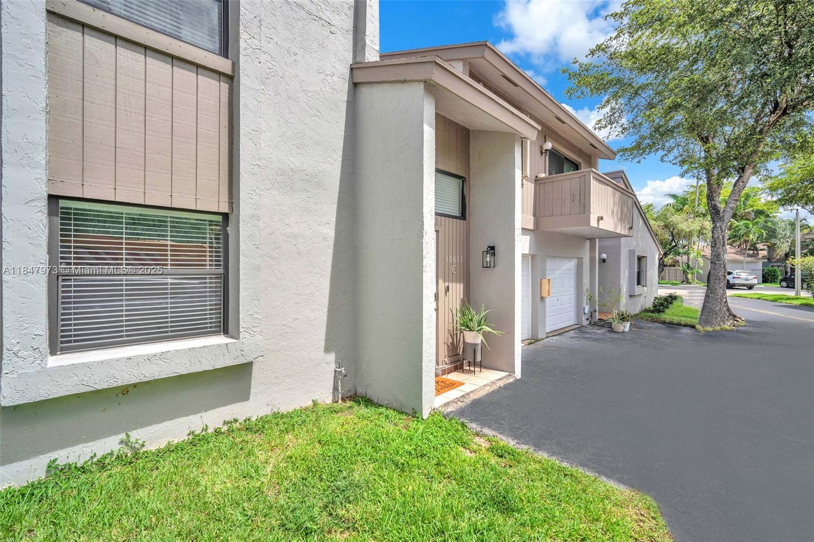 Property Photo: 10611 SW 113th Pl 93-C FL 33176