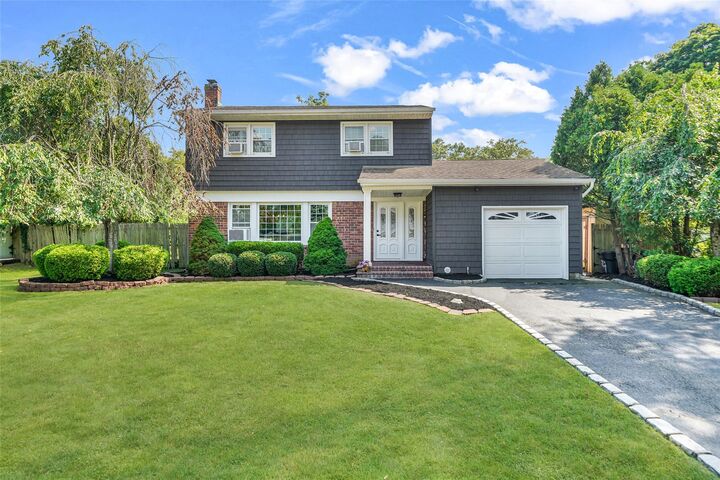 Property Photo:  64 Woodbury Road  NY 11788 