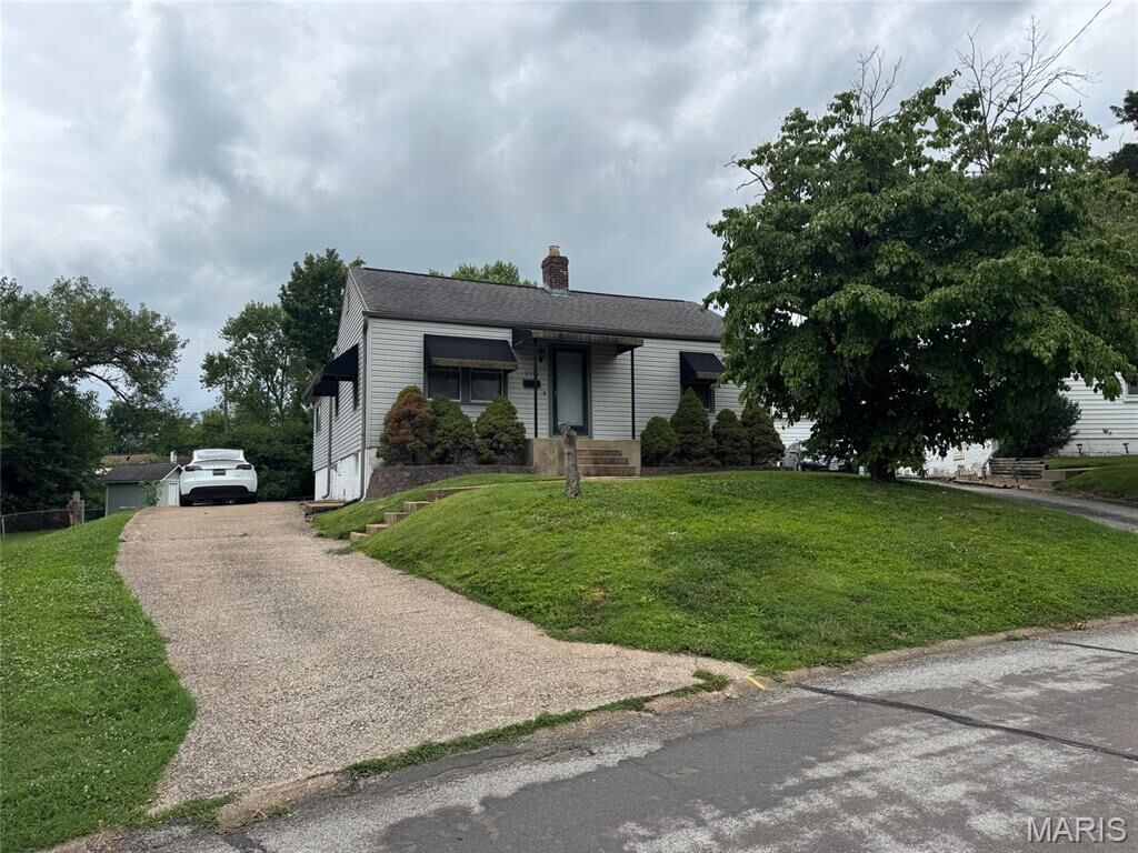 Property Photo:  9550 Bataan Drive  MO 63134 