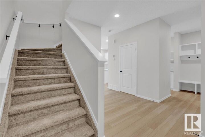 Property Photo: 1142 South Creek Wynd AB T7Z 0J9