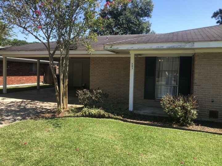 Property Photo:  203 Elmwood Drive  LA 70503 